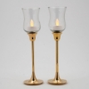 Picture of Brass Candle Holders Contemporary Design Set/2  | 2.75"D x7"H |  Item No. 99014