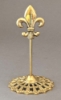 Picture of Brass Card Holder Fleur-de-lis on Round Filigree Base  Set/4  | 3.5"Dx6"H |  Item No. 99605