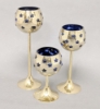 Picture of Set/3 Brass Votive Holder Star Cutouts with Blue Glass Liner | 3"D, 6"-7.5"-9"H| Item No. 90506S