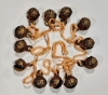 Picture of Bells Brass Tied 12 on a IVORY String  Set/6 Strings  | 36" to 38" Long |  Item No. 5027-12V